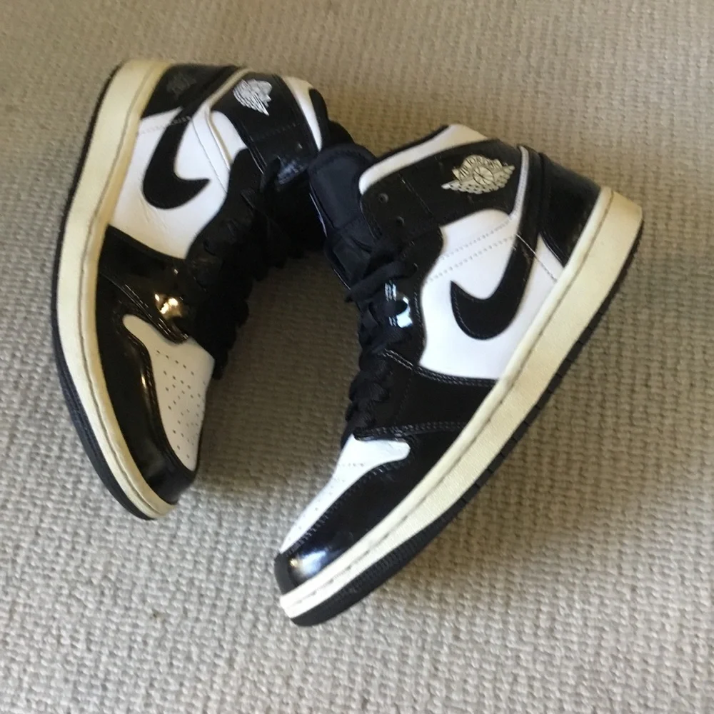 Jordan Black and White High-Top Sneakers